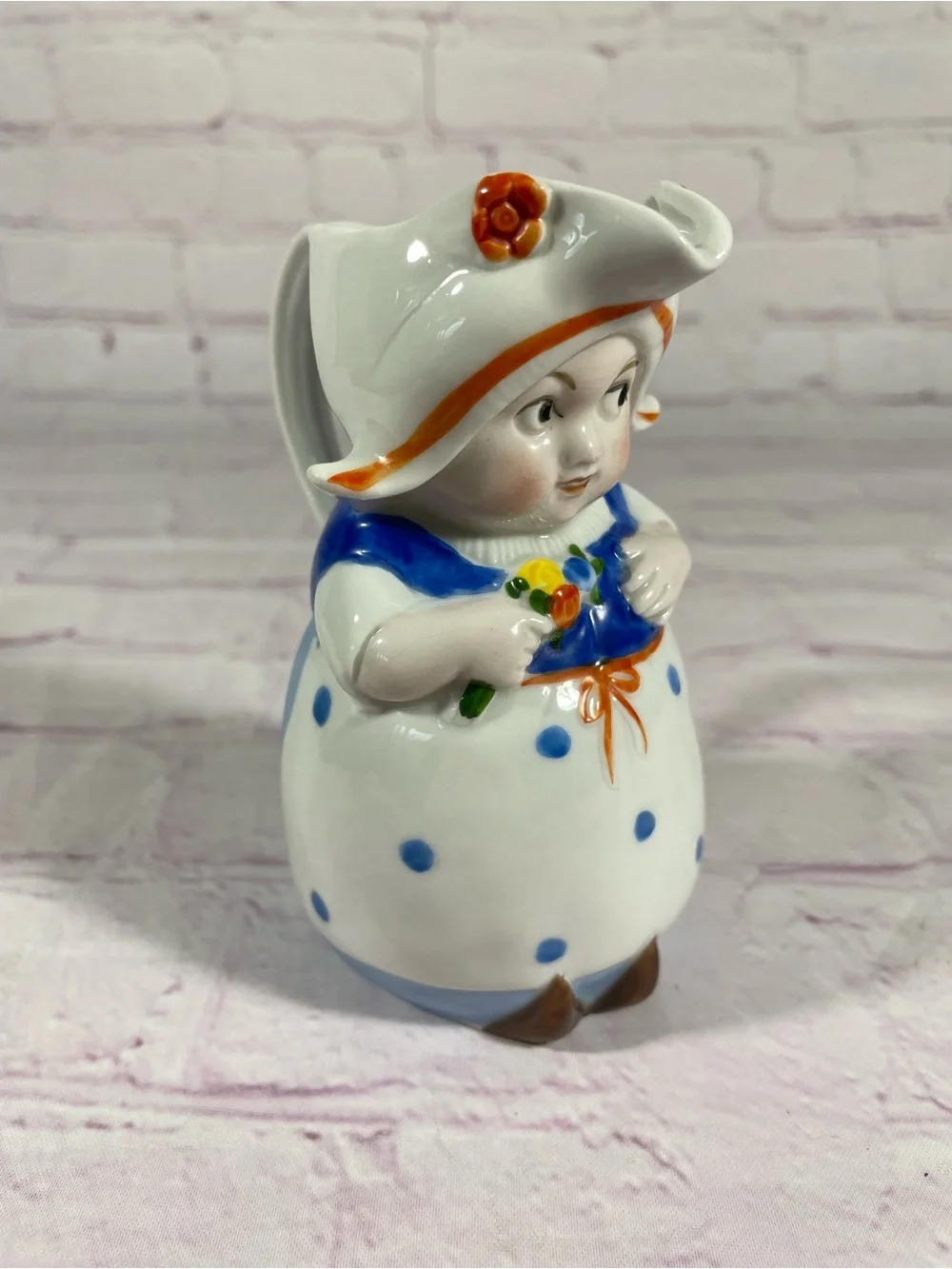 Vintage Dutch Girl Holding Flowers Hand Painted Ceramic Creamer Pitcher Germany
